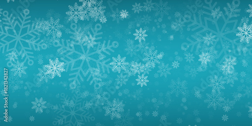 Fondo de invierno azul turquesa con copos de nieve cayendo y desenfoque