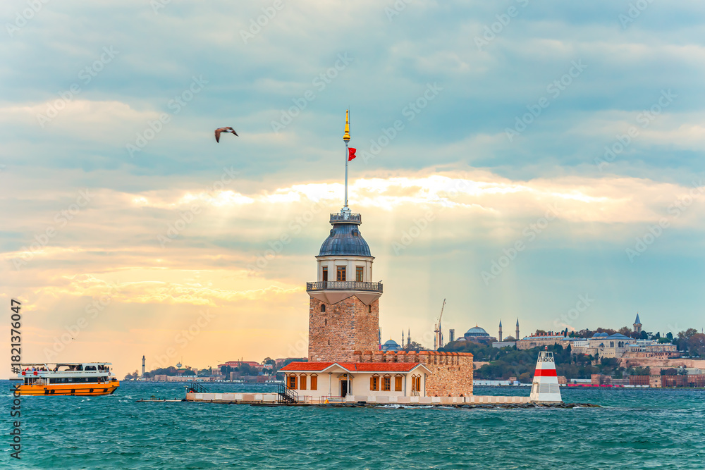 Fototapeta premium Maiden's Tower (or Kız Kulesi) against the dramatic sky.