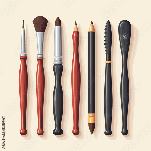 Calligraphy tools set with various brushes and pens on neutral background  