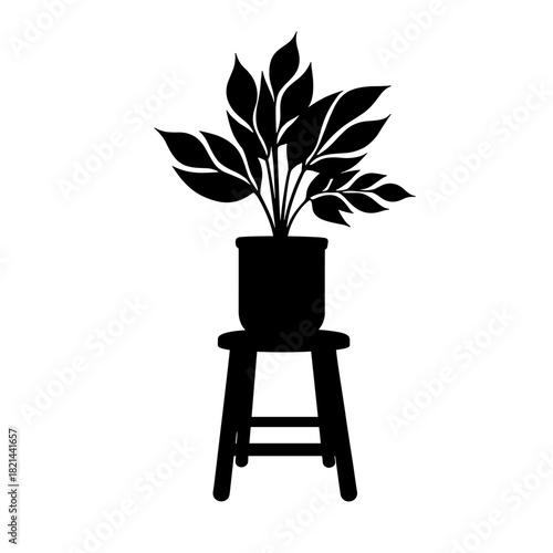 Silhouette of plant in pot on wooden stool, retro simplicity and home decor accent