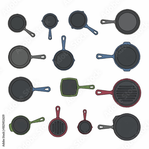 Collection of various cast iron skillets and frying pans isolated.