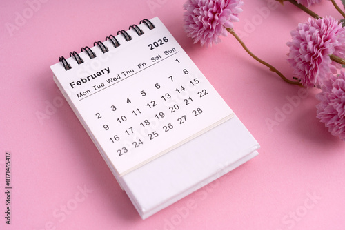 2026 February desk calendar with pink flowers on pastel background