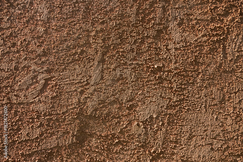 Close-up of brown stucco wall