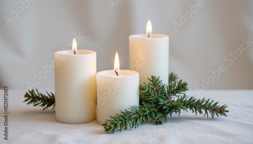White candles evergreen branches pine cones arrangement seasonal arrangement of white candles evergreen foliage and natural pine cones for decor