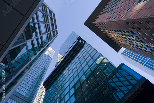 Looking up to skyscrapers at financial district of German city of Frankfurt on a sunny autumn day. Photo taken November 22nd, 2025, Frankfurt am Main, Germany.