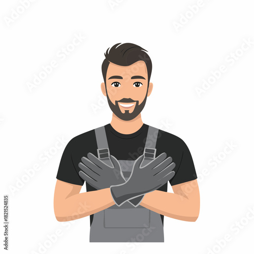 Smiling mechanic in gray overalls crosses arms in front of chest against white backdrop, conveying a sense of confidence and expertise in his profession.