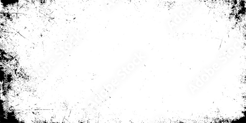 dotted and black and white particles are surrounding in the white background as distressed old stained vintage grunge texture.
