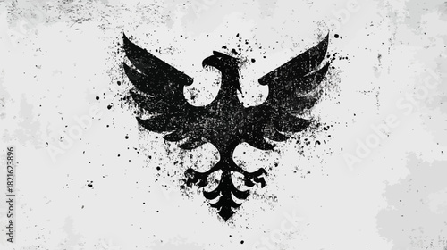 Black grunge eagle emblem with splatters and spread wings, a symbolic heraldic crest design on a textured white background.