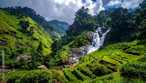 Lush Green Terraces and Cascading Waterfall in a Mountainous Landscape.