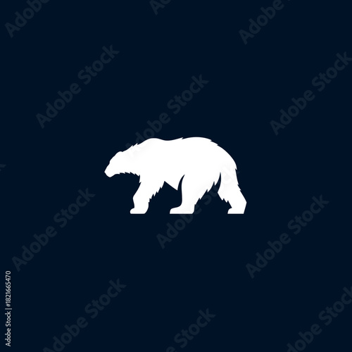 White polar bear silhouette walking, a powerful symbol of Arctic wildlife, nature, and strength on a dark blue background.