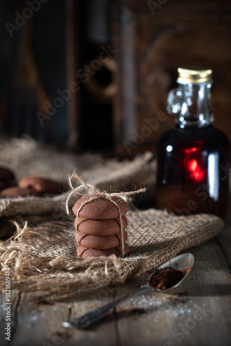 Cookies tied with twine on a rustic table