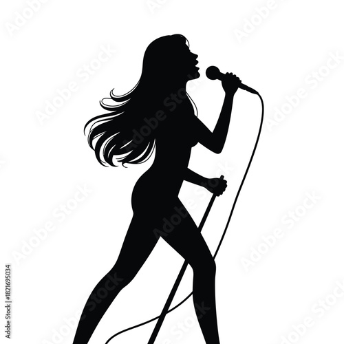 Silhouette of a woman singing into a microphone on stage
