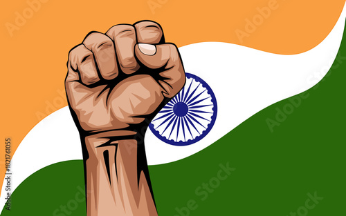 Proud raised fist against the vibrant waving indian national flag