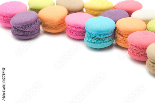 Colorful mini macaroons isolated on white background