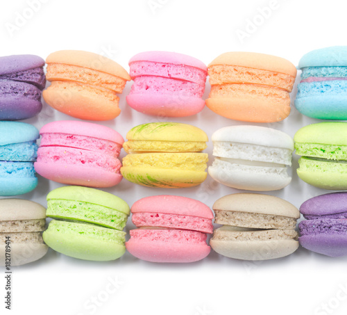 Colorful mini macaroons isolated on white background