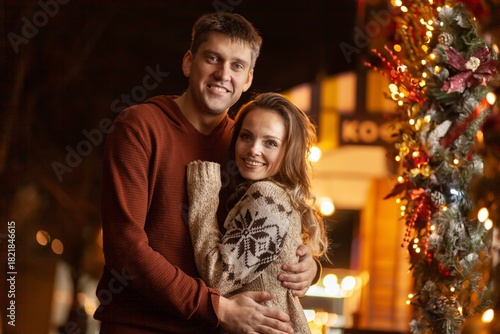 Young romantic couple in christmas or new year