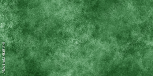 Abstract Elegant dark green background with mottled vintage texture in old fancy background design, texture of colored parchment paper.
