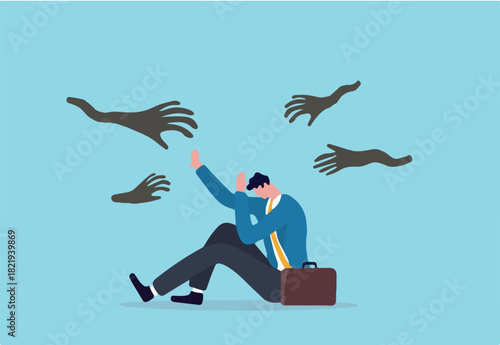 Fear or afraid of failure, struggle or shackle, feeling depressed or disorder, phobia, anxiety or stressed burnout or negative thinking concept, fearful businessman sitting with evil hand threaten. 