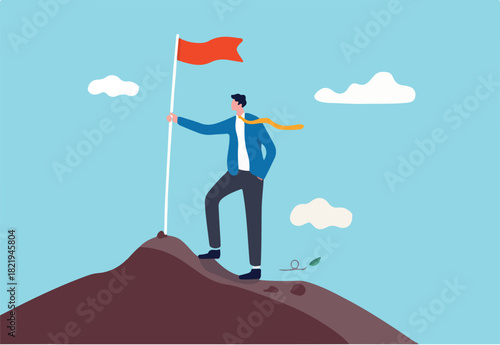 Business goal achievement, success career development or motivation and work or project accomplishment concept, confidence businessman standing proudly with victory flag on high mountain peak up hill.