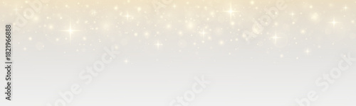 Shimmering rain of stars with luxurious glamour. Festive sparkle and stardust on a bright holiday background.