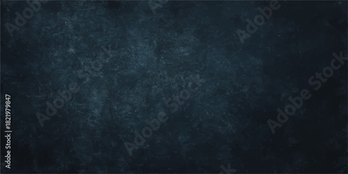 Dark blue grunge texture wall background with old vintage blank chalkboard surface pattern