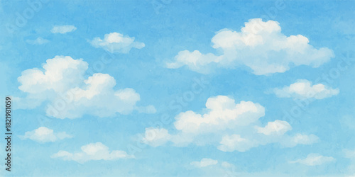 Bright blue summer sky with fluffy white clouds, a beautiful and clear day atmosphere
