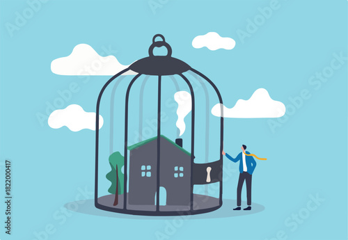 Mortgage payment problem, housing debt in economic crisis concept, worried house owner businessman standing with his house inside locked bird cage.
