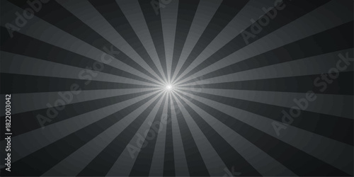 Dramatic black and white sunburst background with central glowing light source