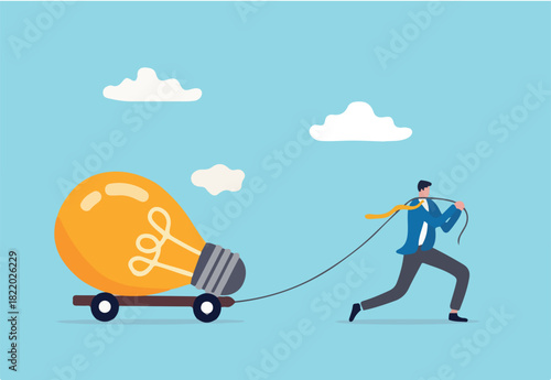 Big business idea, innovation or inspiration to start new business, effort or inspiration for creativity ideas concept, ambitious businessman work hard to pulling big light bulb idea
