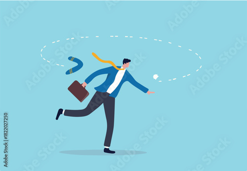 Karma boomerang, sin or consequence of evil action return to himself, disaster and responsibility concept, businessman throw boomerang and it return to hurt himself.
