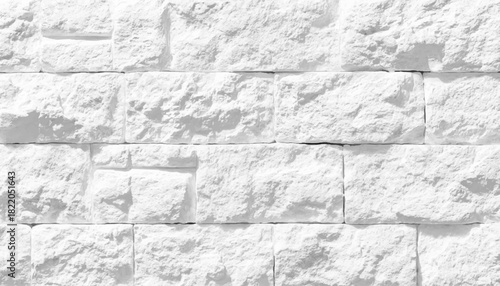 A detailed closeup of a stone wall with a grey bedrock pattern. Natural pattern brick stone wall for wallpaper background.
