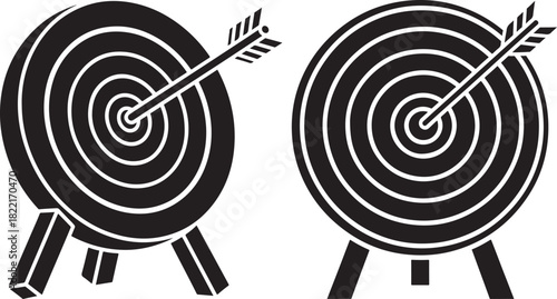 Two target boards with arrows hitting the center
