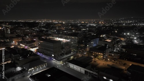 Wallpaper Mural Drone orbits to the left around the east side of Maboneng District at night in Johannesburg, South Africa Torontodigital.ca