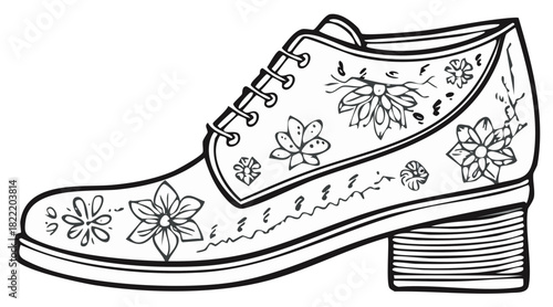 Black and white illustration of a single oxford shoe adorned with floral designs and decorative stitching