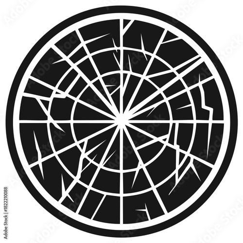 Shattered black and white circular target with radiating cracks and broken geometric lines