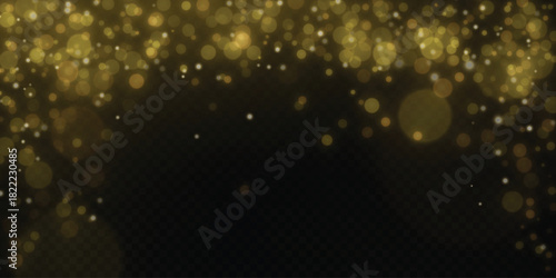 Glowing gold dust with soft bokeh lights, shimmering particles and festive sparkle creating an elegant glowing decorative effect.