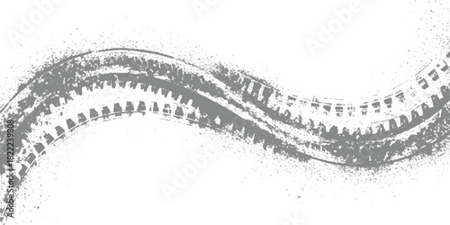 Grungy wavy gray tire track marks with muddy splatters on white background