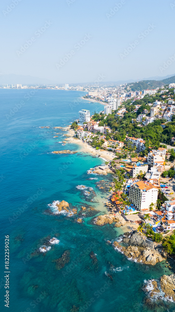 Fototapeta premium Puerto vallarta coastline aerial view featuring tropical beaches in Mexico