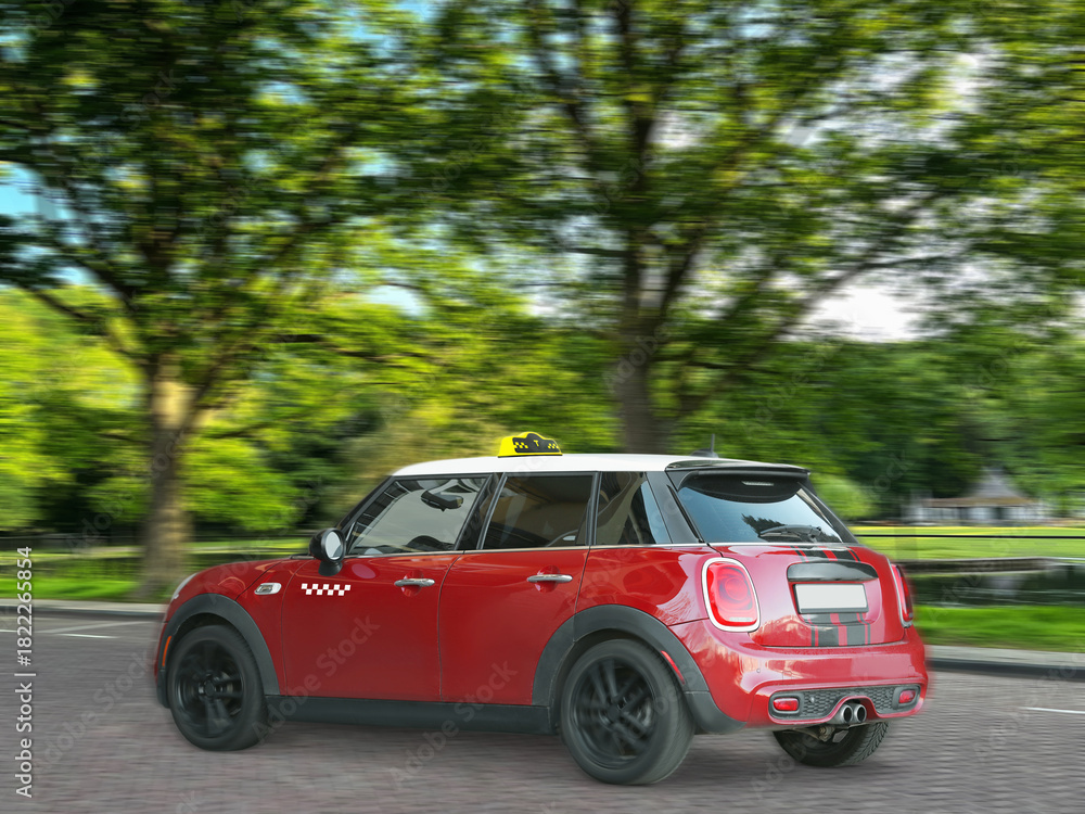Fototapeta premium Taxi with top sign driving on road. Motion blur effect