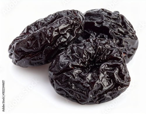 dried plums isolated on white background