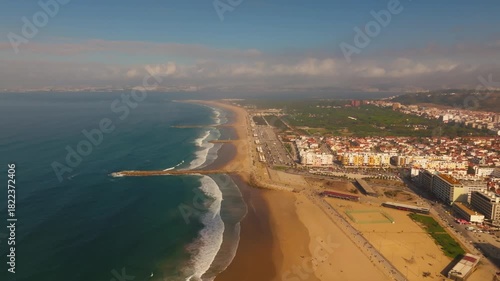 Aerial View of Surfers at Costa da Caparica Beach Daytime