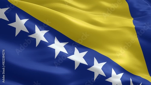 Dynamic Bosnia and Herzegovina flag waving gently in a breeze creating a patriotic and nationalistic mood for travel or cultural projects