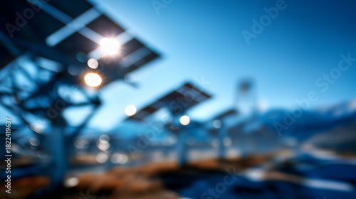 Fototapeta Naklejka Na Ścianę i Meble -  Photovoltaic power station installation defocused solar background renewable energy facility electricity generation plant sustainable power production with copy space