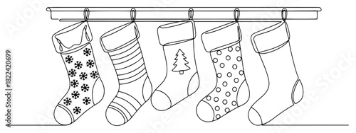 Hanging Christmas stockings continuous one line drawing set of festive socks with patterns minimalist vector illustration
