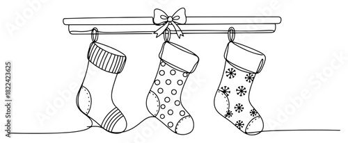 Three patterned Christmas stockings hanging on a shelf or mantelpiece vector illustration in black and white line art style