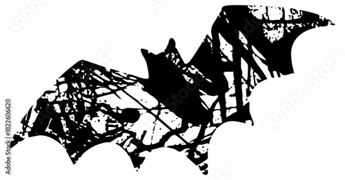 Bat flies dynamically in nighttime silhouette