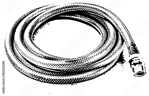 Garden hose coils tightly in a backyard
