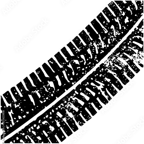 Tire tracks imprint diagonally a surface