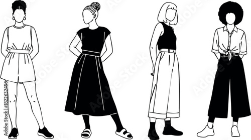 Diverse group of four stylish women in modern casual outfits standing in different poses