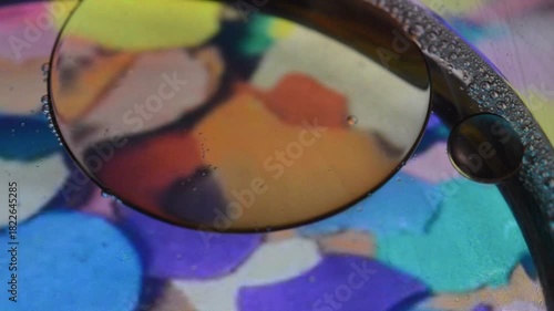 Colorful abstract oil bubbles floating in water